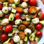 Tomato Cucumber Avocado Salad with Mozzarella and Basil Pesto 19 Tomato Cucumber Avocado Salad with Mozzarella and Basil Pesto